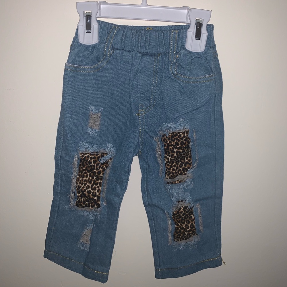 Distressed Jeans with cheetah patches